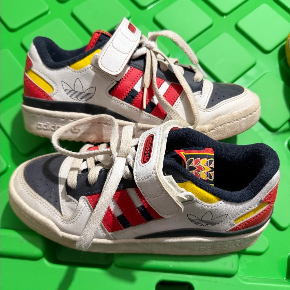 adidas Kids White Sneakers with Red, Black & Yellow Accents